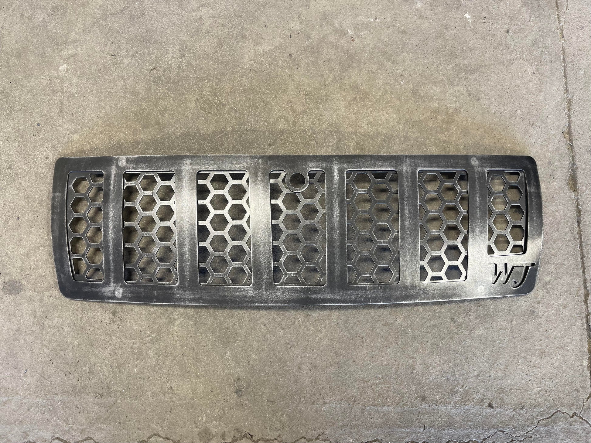 This is a customers grille that had contacted us about intigrading a camera mount into the more origonal & slot option we offer. This will give you a good idea of how the 7 slot looks like!